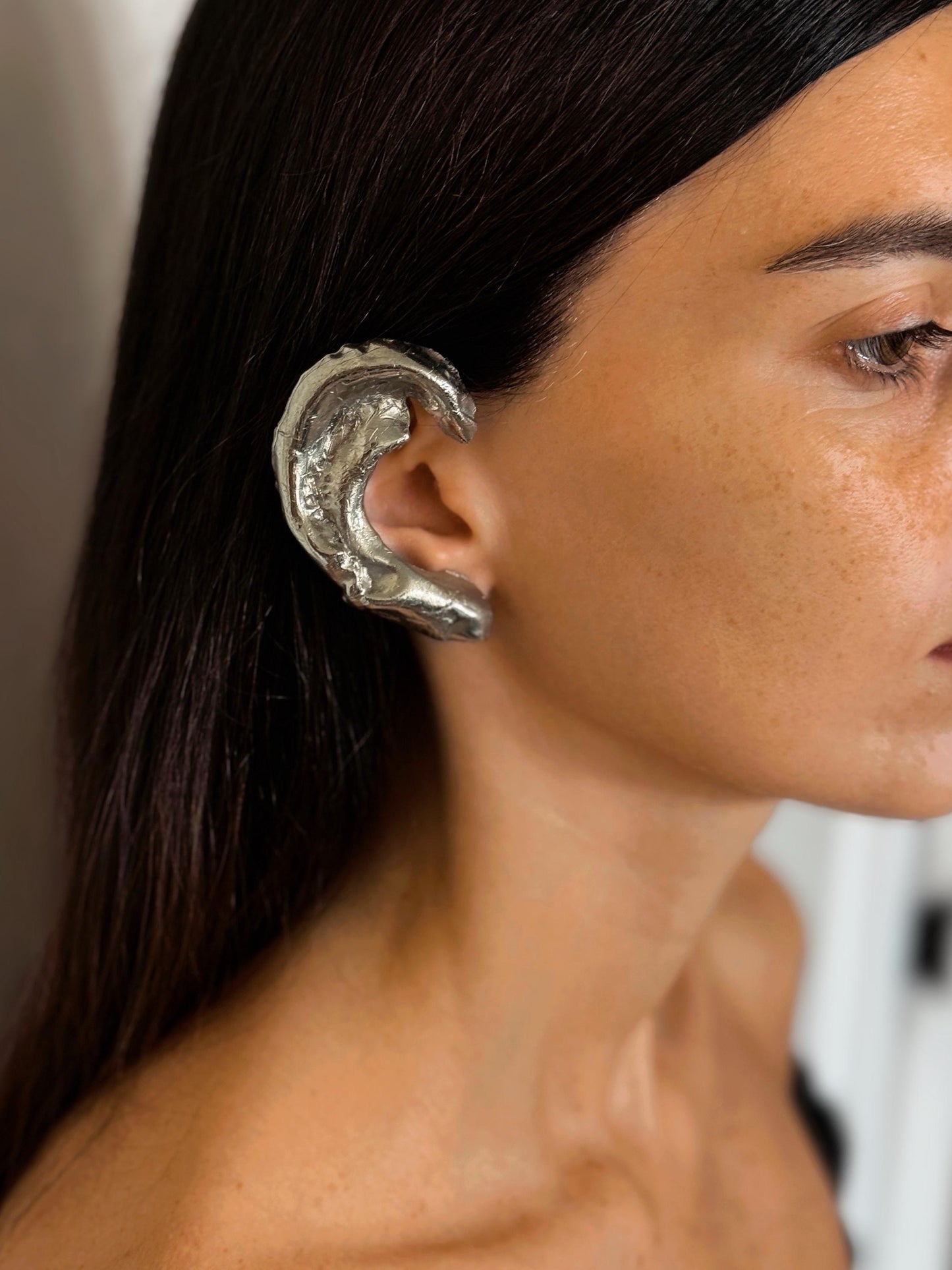 ვერცხლის სკულპტურული საყურე